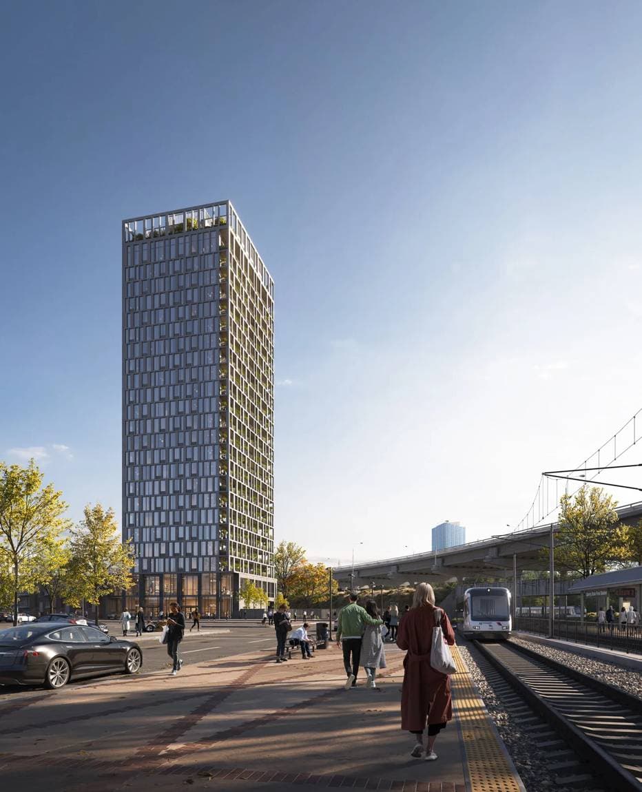 Contemporary tower beside a city rail station