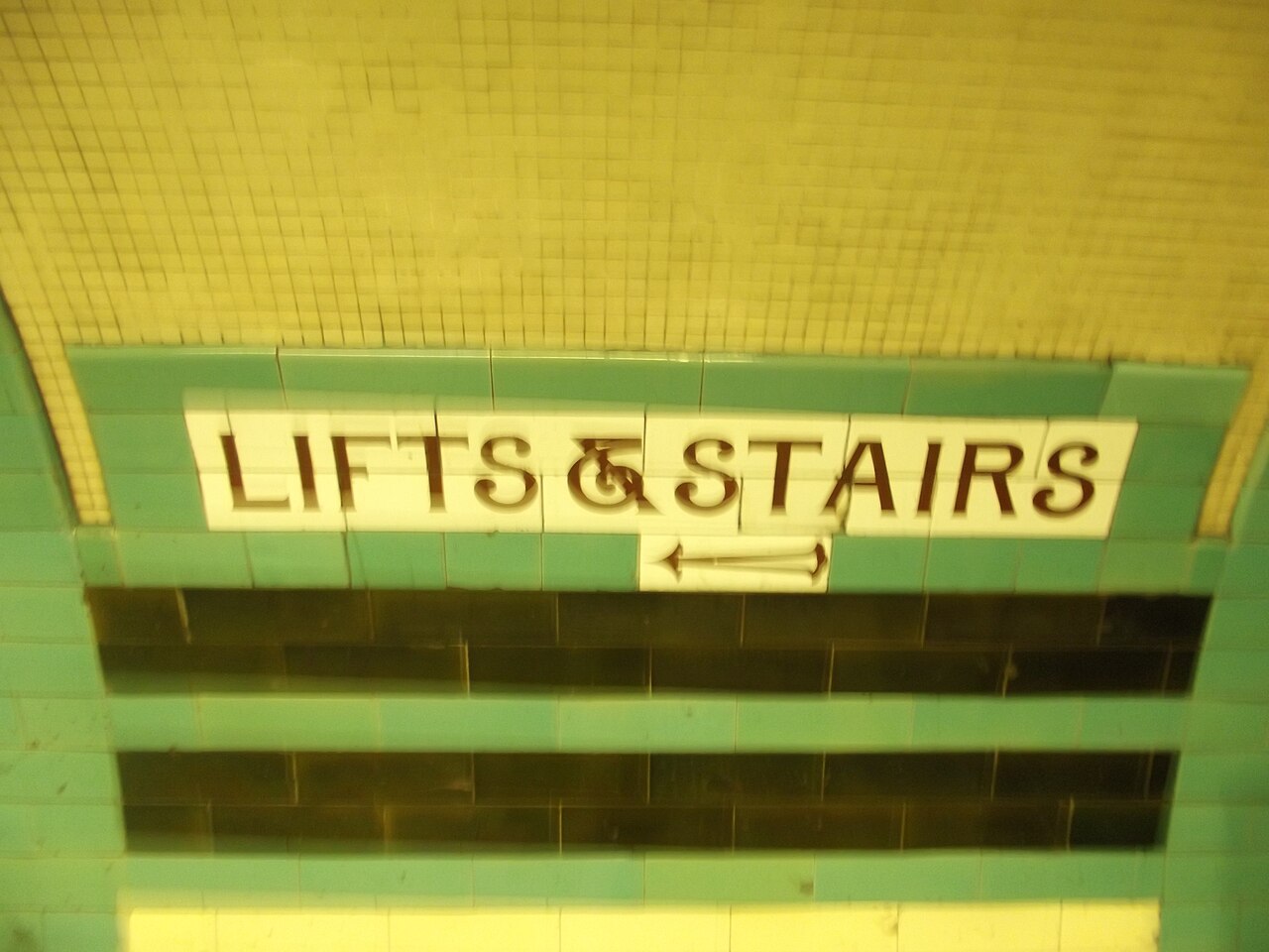 A sign for the lift and stairs at Russell Square Underground station, London