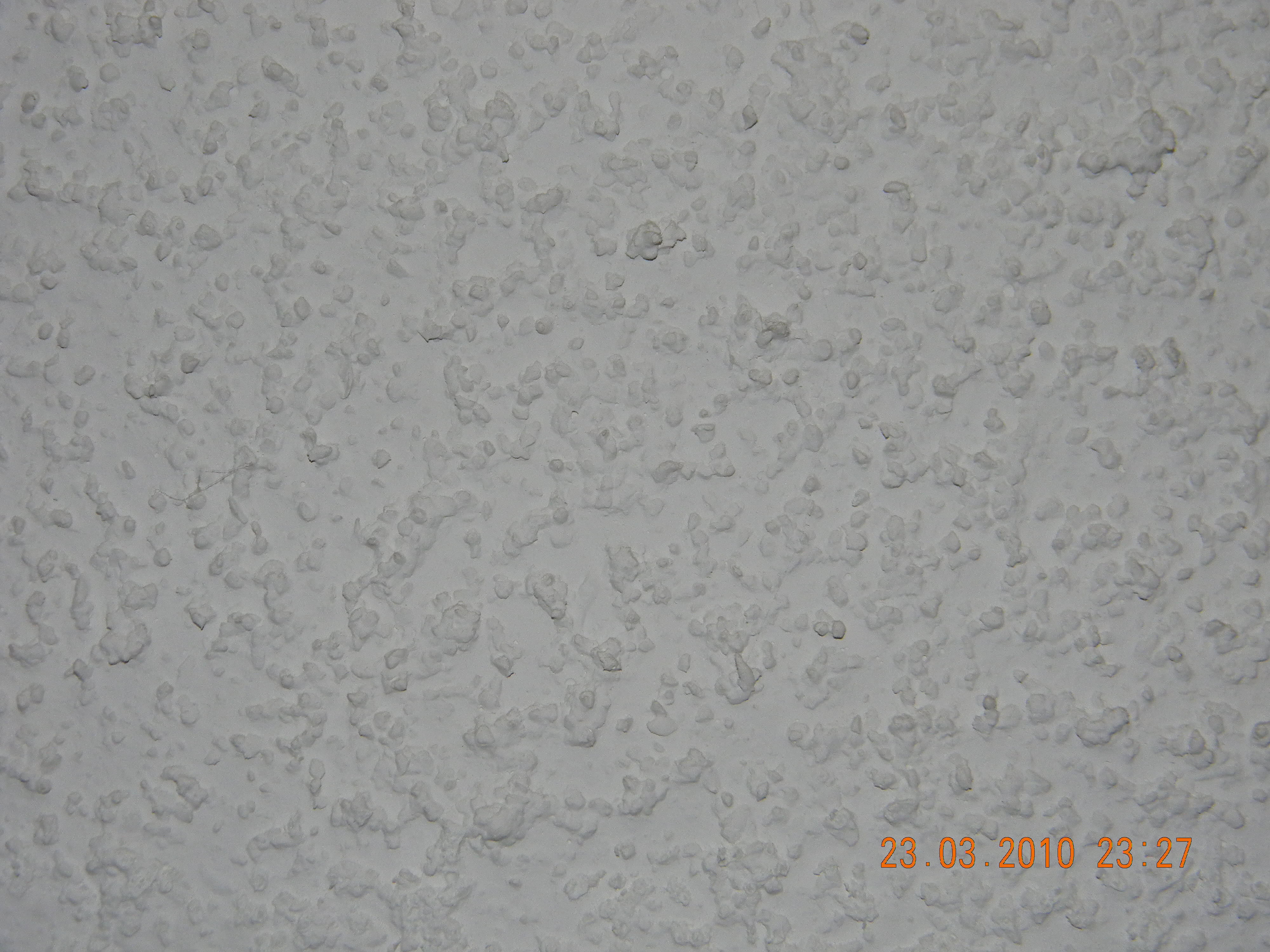Gypsum plaster applied over a plasterboard-clad air duct casing