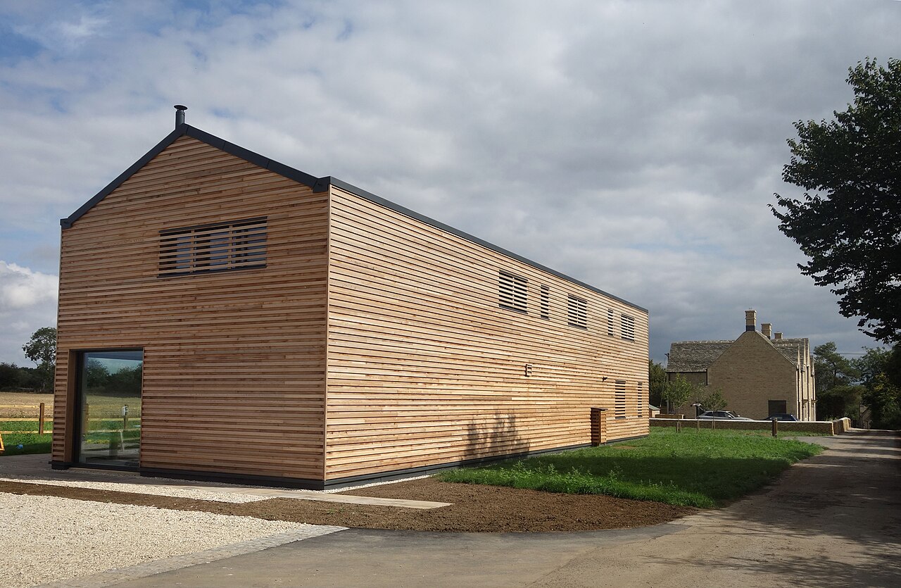 A timber-clad house in Ampney Crucis