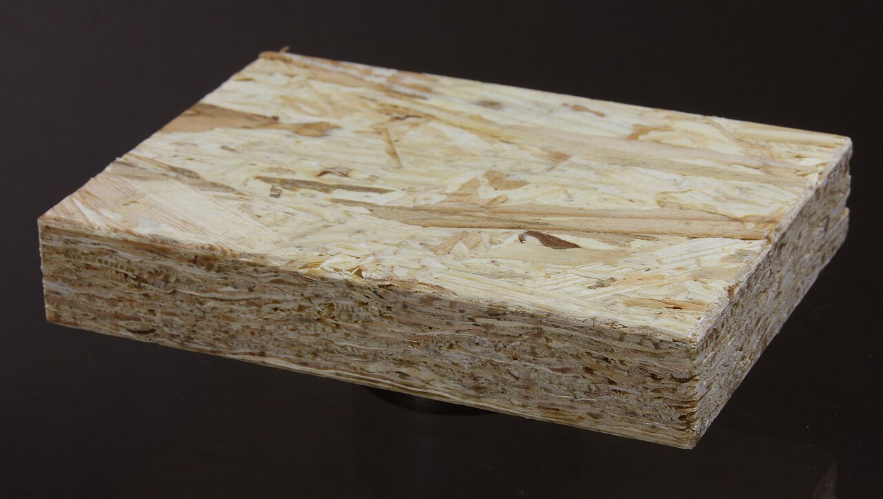 Stack of OSB/3 boards showing the strand surface and board edges