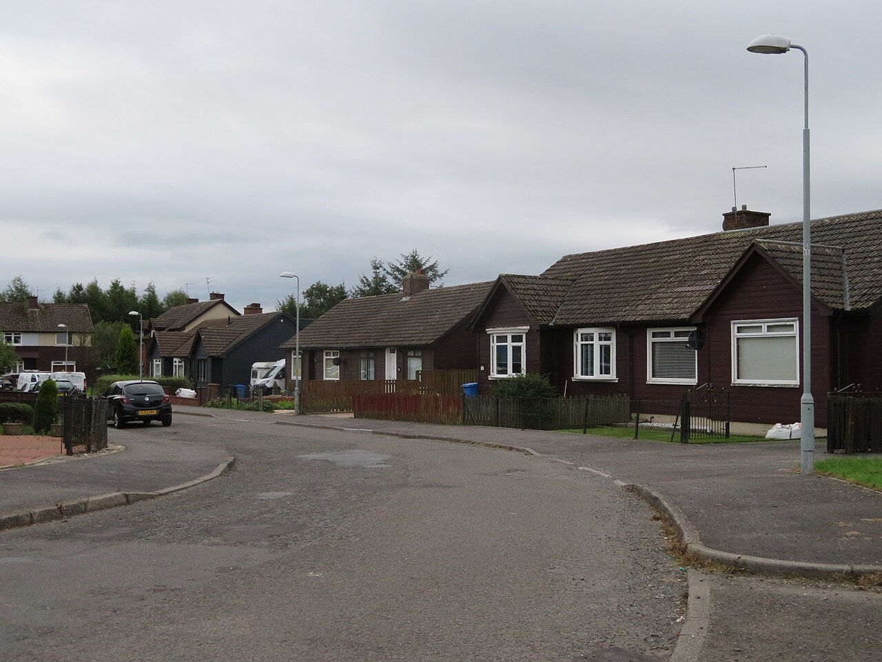 Timber-clad houses on Croftfoot Drive
