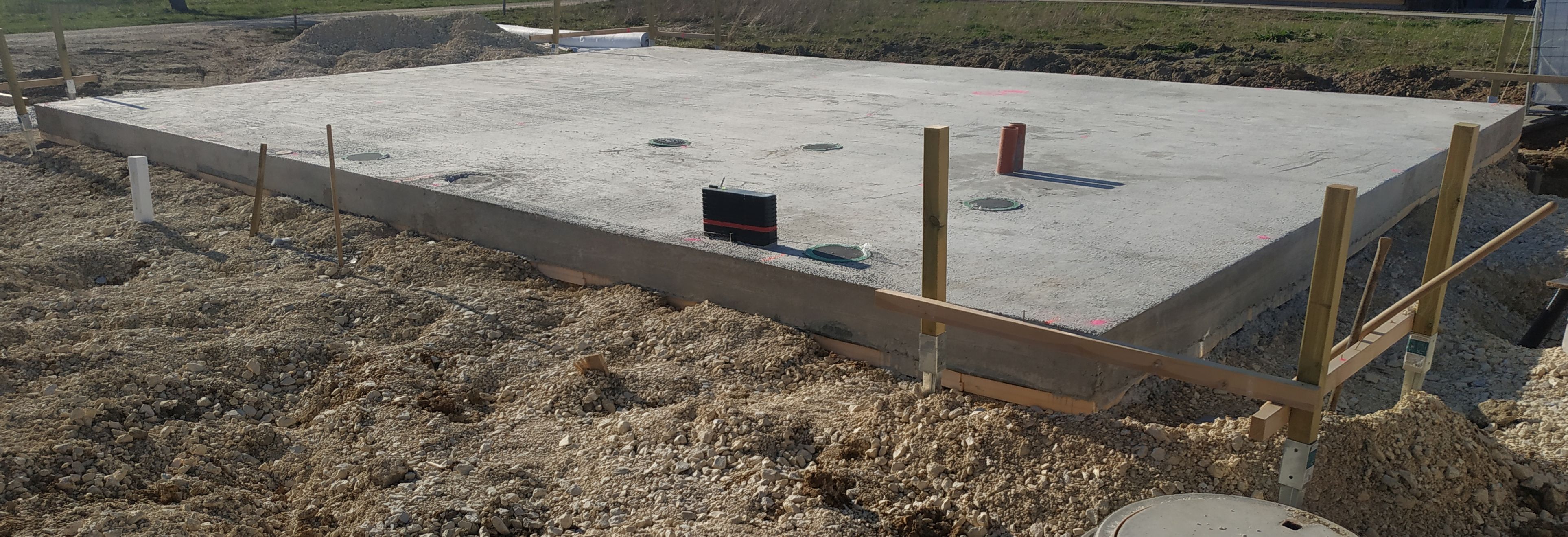 A ground slab cast on a layer of insulation in a building without a basement
