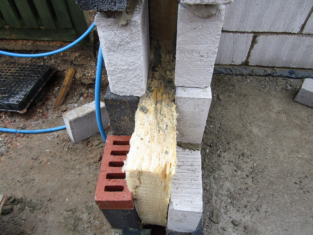 A cavity wall under construction with insulation against the blockwork, Trimingham, Norfolk
