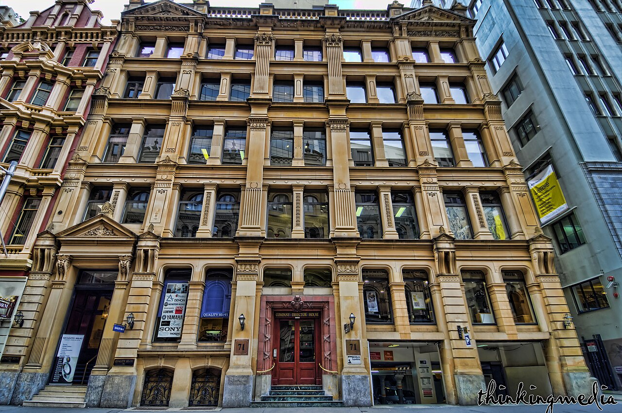 A Victorian commercial building with a stone facade and aluminium windows fitted during a 1984 upgrade