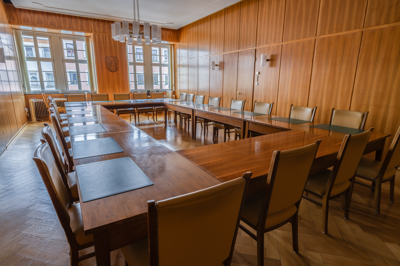 A council meeting room in Hof town hall, Germany, with walls clad in wooden panelling
