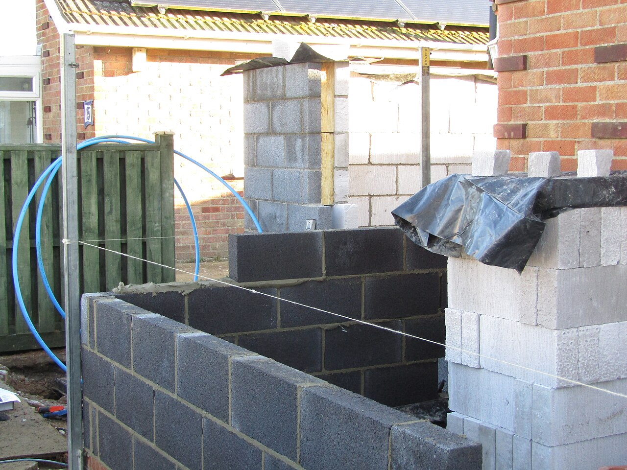 Blockwork walls being built on a small construction site in Trimingham, Norfolk