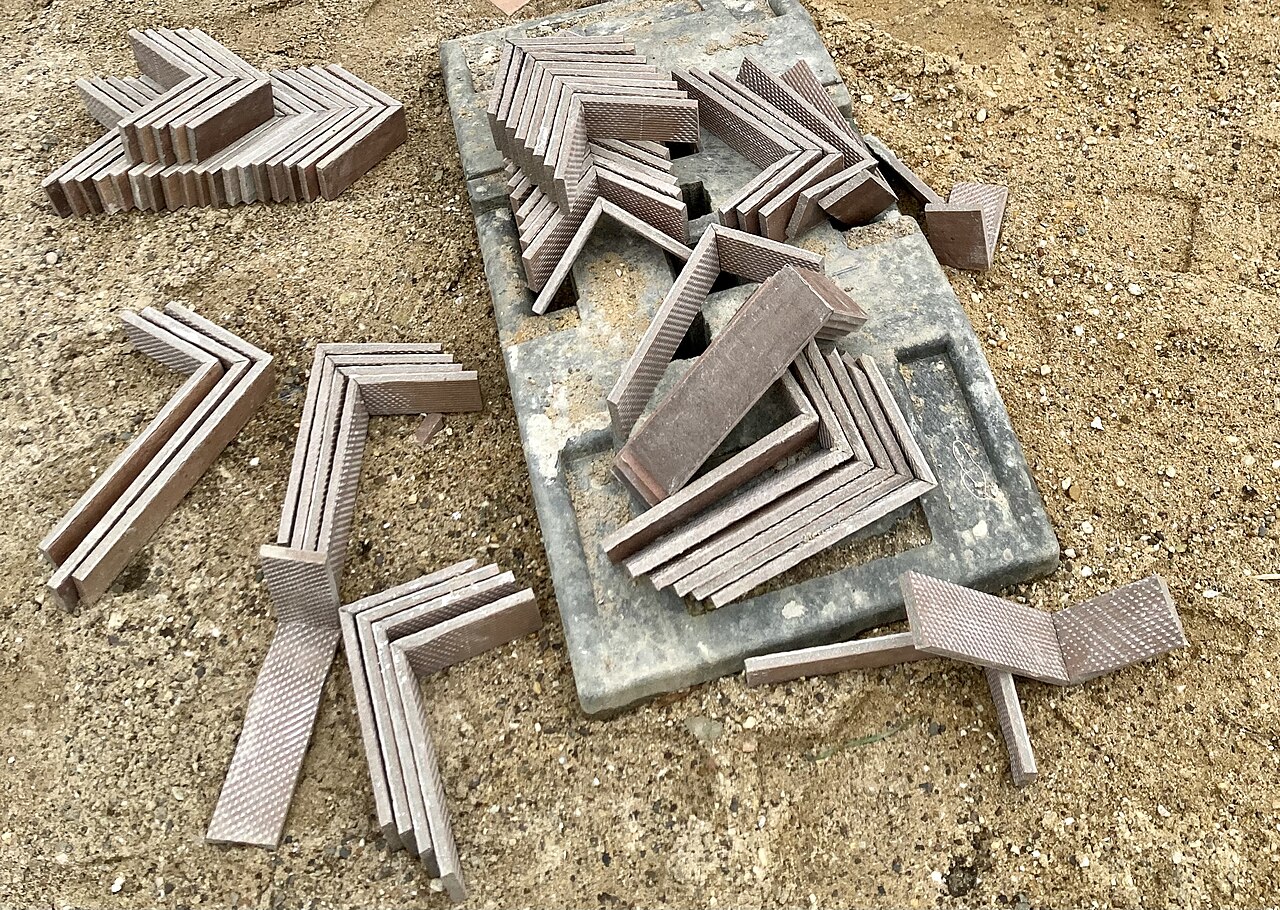 Brick slips on a building site, ready to be fixed to an external wall insulation system