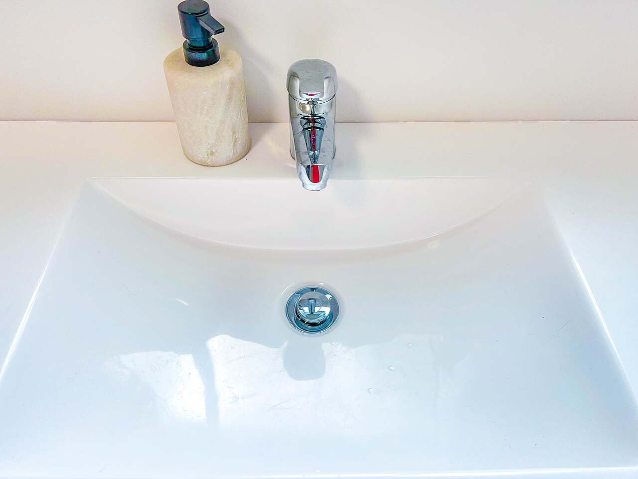 A tap on a bathroom basin