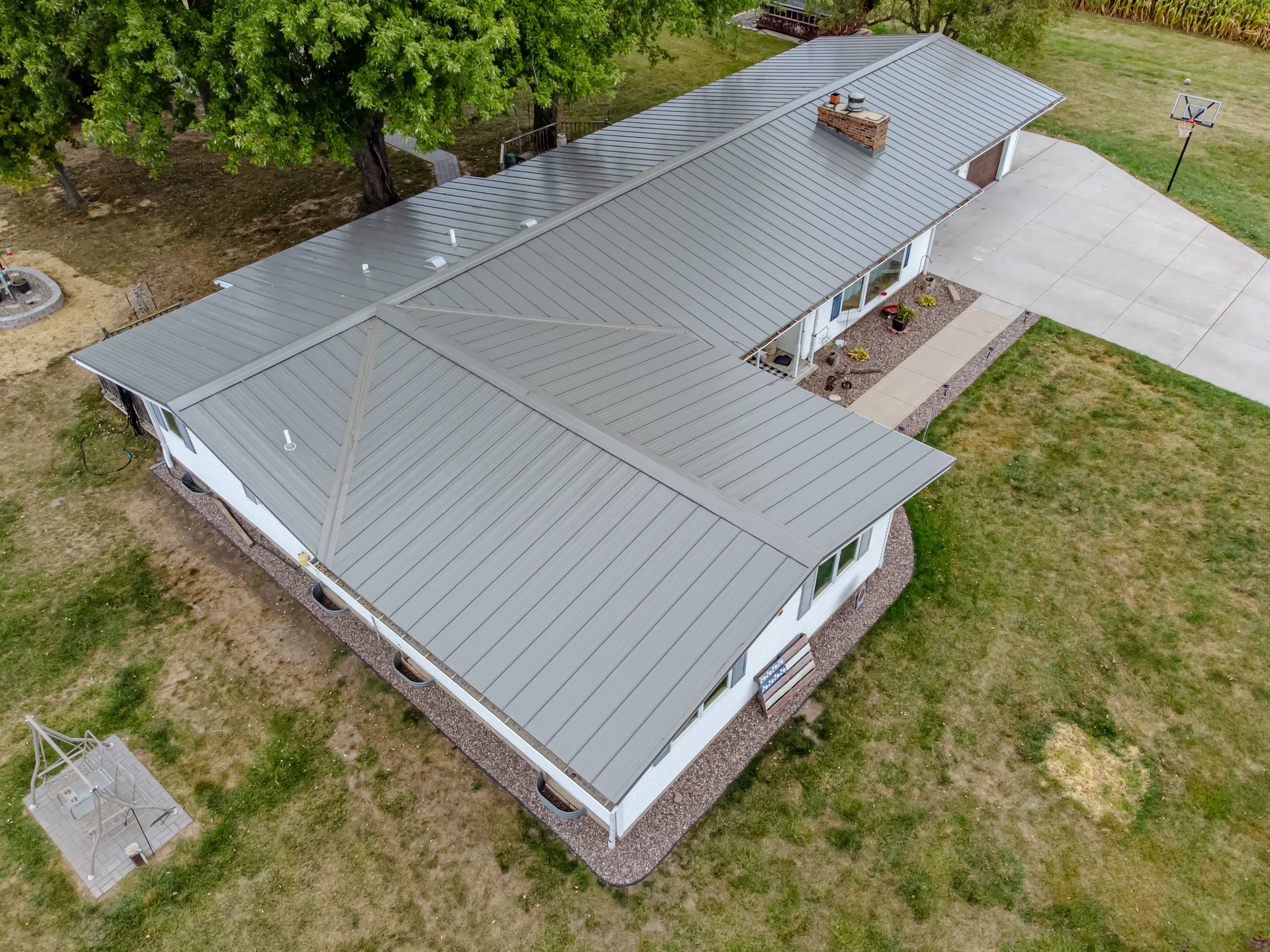A low-pitched standing seam metal roof