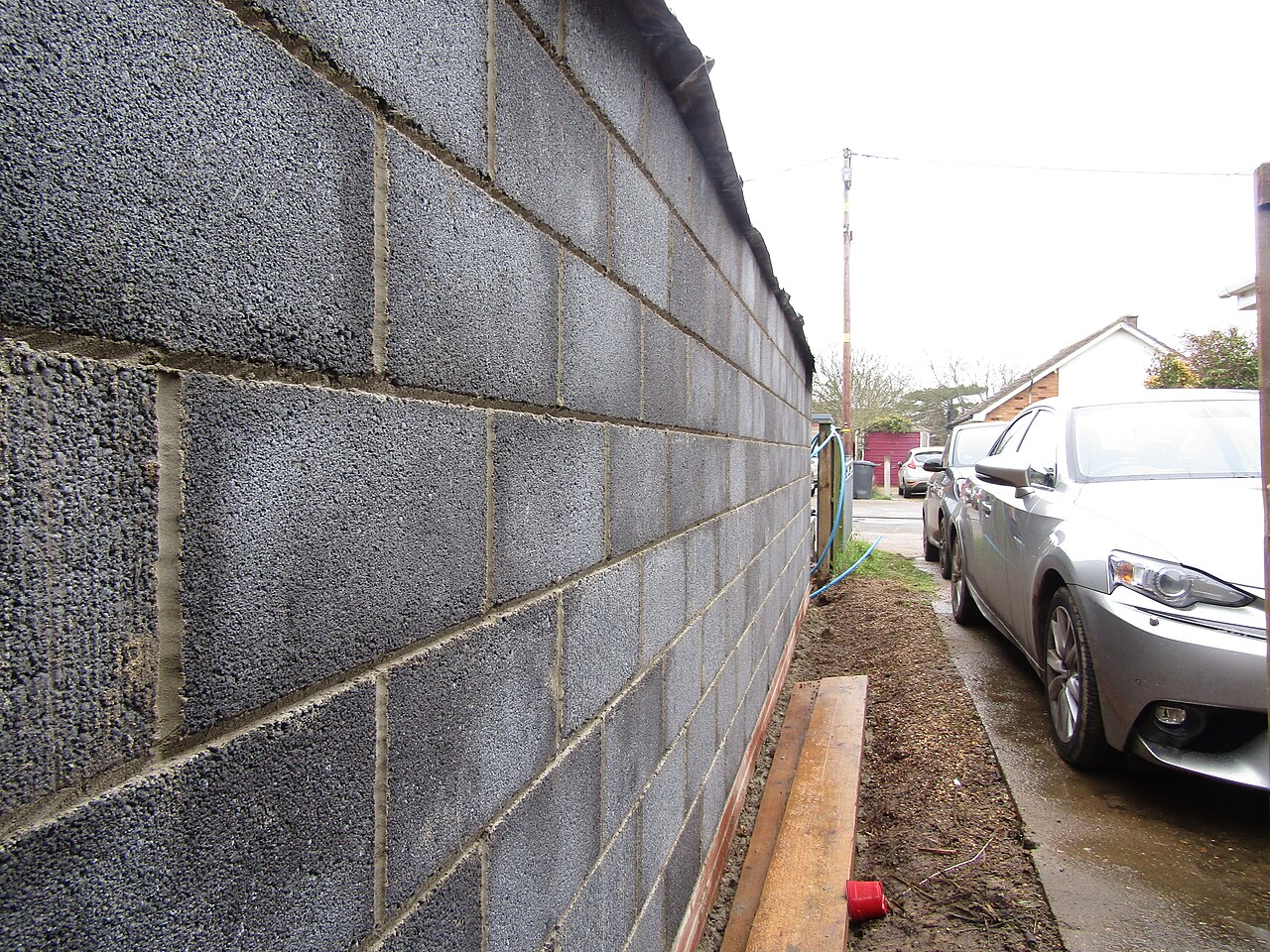 A wall being built in concrete blocks on a construction site in Trimingham, Norfolk