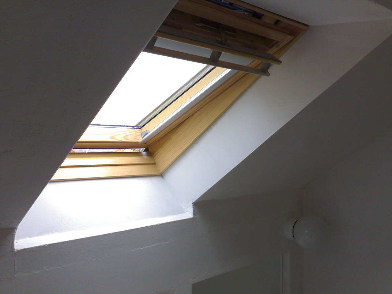 A roof window set into a pitched roof