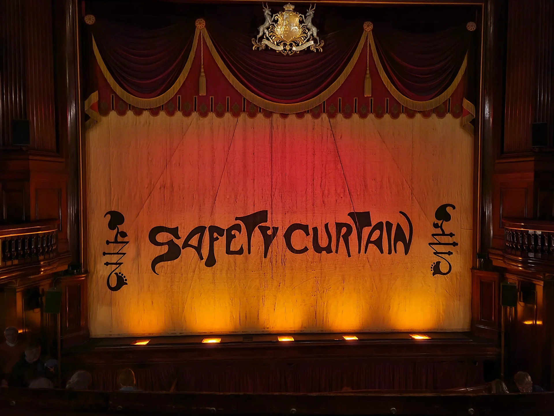 The safety curtain at St Martin's Theatre, London