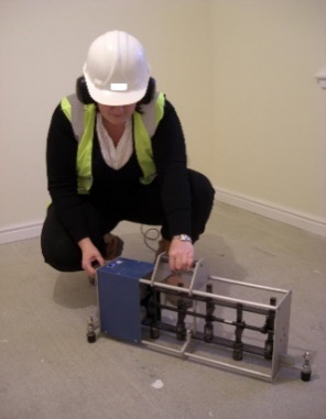 Figure 4 Impact sound test being carried Figure 5 Typical tapping machines for